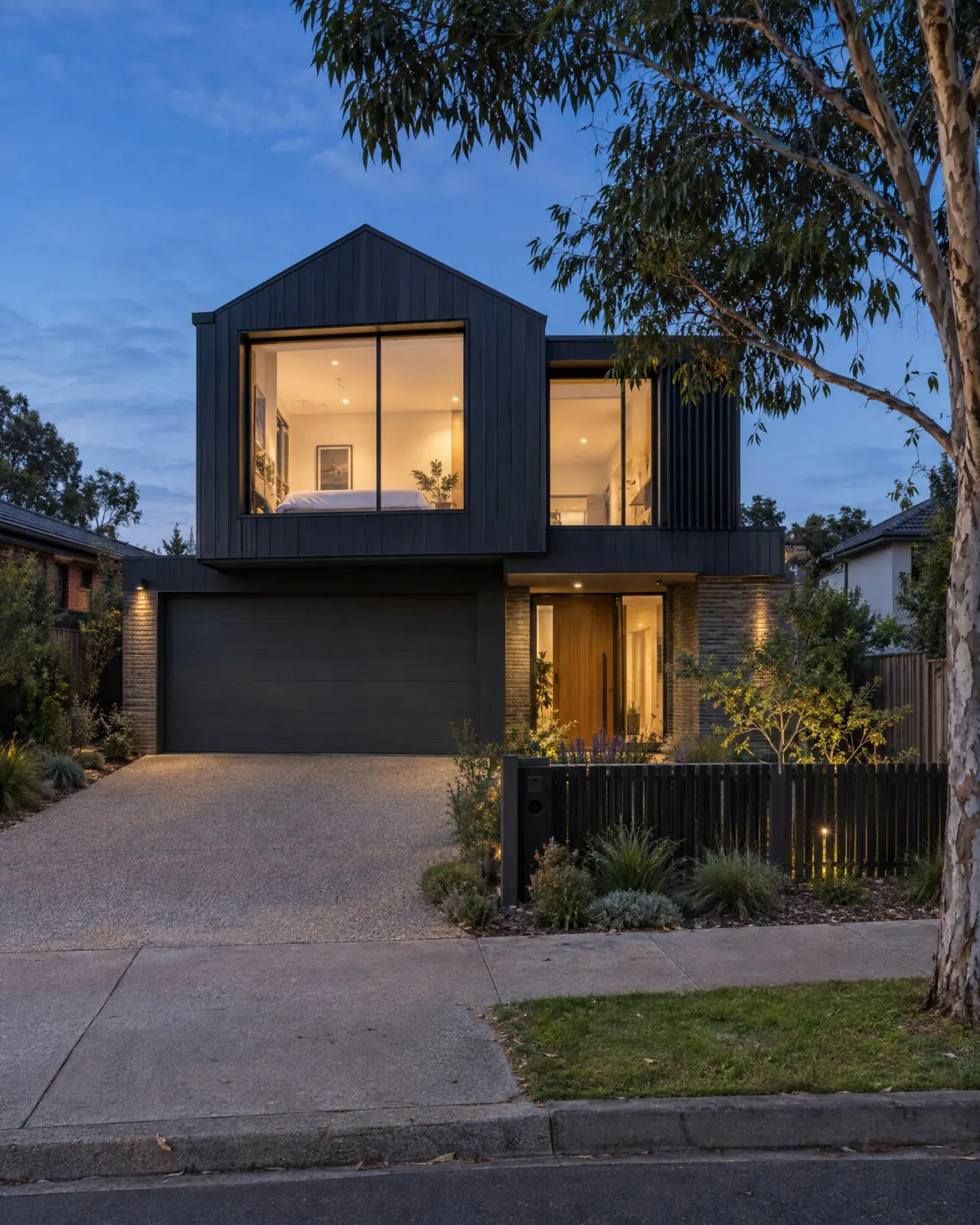Double-storey Melbourne home at twilight